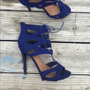 Blue strap up high heels